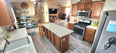 Presenting this well-maintained 3-bedroom, 2-bath home built in on Palm Desert Greens Country Club in California - for sale on GolfHomes.com, golf home, golf lot