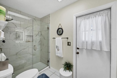 This beautifully maintained 3-bedroom, 2-bathroom pool home on Rotonda Golf and Country Club The Palms Course in Florida - for sale on GolfHomes.com, golf home, golf lot