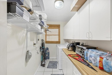 This beautifully maintained 3-bedroom, 2-bathroom pool home on Rotonda Golf and Country Club The Palms Course in Florida - for sale on GolfHomes.com, golf home, golf lot