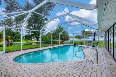 This beautifully maintained 3-bedroom, 2-bathroom pool home on Rotonda Golf and Country Club The Palms Course in Florida - for sale on GolfHomes.com, golf home, golf lot