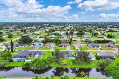 This beautifully maintained 3-bedroom, 2-bathroom pool home on Rotonda Golf and Country Club The Palms Course in Florida - for sale on GolfHomes.com, golf home, golf lot