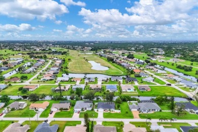 This beautifully maintained 3-bedroom, 2-bathroom pool home on Rotonda Golf and Country Club The Palms Course in Florida - for sale on GolfHomes.com, golf home, golf lot