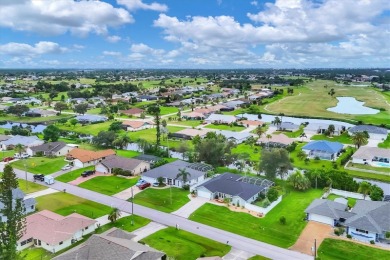 This beautifully maintained 3-bedroom, 2-bathroom pool home on Rotonda Golf and Country Club The Palms Course in Florida - for sale on GolfHomes.com, golf home, golf lot