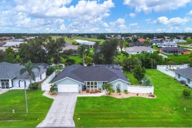 This beautifully maintained 3-bedroom, 2-bathroom pool home on Rotonda Golf and Country Club The Palms Course in Florida - for sale on GolfHomes.com, golf home, golf lot