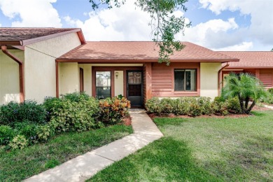 Charming 2-bed/2-bath Condo with Florida Room in Hudson! on Beacon Woods Golf Club in Florida - for sale on GolfHomes.com, golf home, golf lot