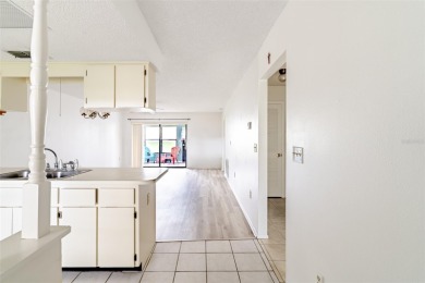 Charming 2-bed/2-bath Condo with Florida Room in Hudson! on Beacon Woods Golf Club in Florida - for sale on GolfHomes.com, golf home, golf lot