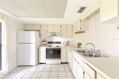 Charming 2-bed/2-bath Condo with Florida Room in Hudson! on Beacon Woods Golf Club in Florida - for sale on GolfHomes.com, golf home, golf lot