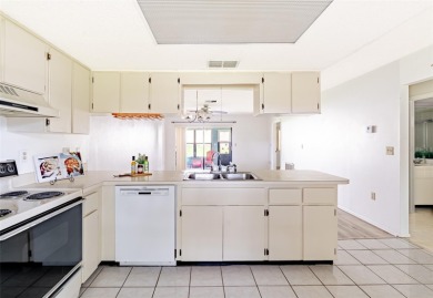 Charming 2-bed/2-bath Condo with Florida Room in Hudson! on Beacon Woods Golf Club in Florida - for sale on GolfHomes.com, golf home, golf lot