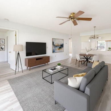 Charming 2-bed/2-bath Condo with Florida Room in Hudson! on Beacon Woods Golf Club in Florida - for sale on GolfHomes.com, golf home, golf lot