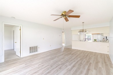Charming 2-bed/2-bath Condo with Florida Room in Hudson! on Beacon Woods Golf Club in Florida - for sale on GolfHomes.com, golf home, golf lot
