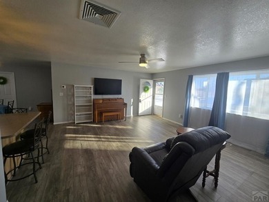 Super clean, nicely update 3 bed 2 bath 2 car garage in awesome on Hollydot Golf Course in Colorado - for sale on GolfHomes.com, golf home, golf lot