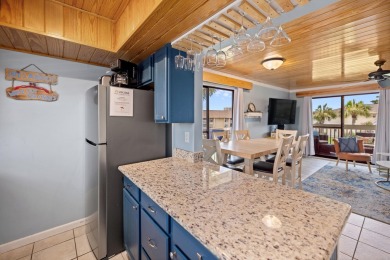 Discover this elegantly appointed second-floor, 2-bedroom on Sandpiper Cove Golf Course in Florida - for sale on GolfHomes.com, golf home, golf lot