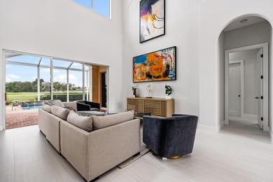 This stunning, renovated estate home is ideally situated within on  in Florida - for sale on GolfHomes.com, golf home, golf lot