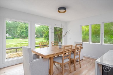Flooded with natural light, this stunning Scandinavian-inspired on The Landings Club - Plantation in Georgia - for sale on GolfHomes.com, golf home, golf lot