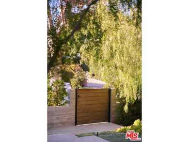 Renovated by renowned architecture firm Rios Clementi Hale, this on Wilshire Country Club in California - for sale on GolfHomes.com, golf home, golf lot