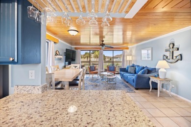 Discover this elegantly appointed second-floor, 2-bedroom on Sandpiper Cove Golf Course in Florida - for sale on GolfHomes.com, golf home, golf lot