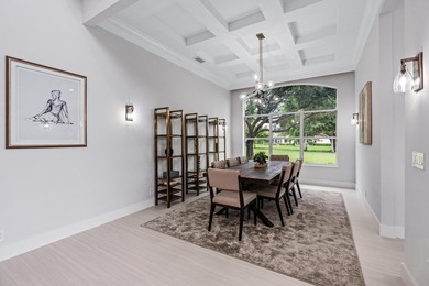 This stunning, renovated estate home is ideally situated within on  in Florida - for sale on GolfHomes.com, golf home, golf lot