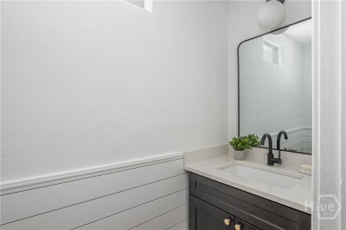 Flooded with natural light, this stunning Scandinavian-inspired on The Landings Club - Plantation in Georgia - for sale on GolfHomes.com, golf home, golf lot