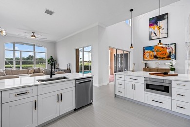 This stunning, renovated estate home is ideally situated within on  in Florida - for sale on GolfHomes.com, golf home, golf lot