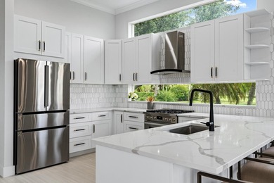 This stunning, renovated estate home is ideally situated within on  in Florida - for sale on GolfHomes.com, golf home, golf lot