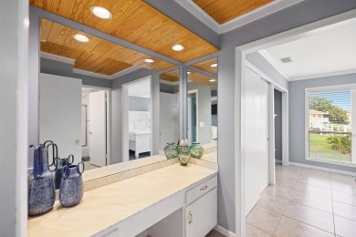 Discover this elegantly appointed second-floor, 2-bedroom on Sandpiper Cove Golf Course in Florida - for sale on GolfHomes.com, golf home, golf lot