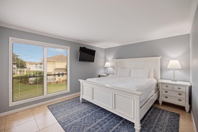 Discover this elegantly appointed second-floor, 2-bedroom on Sandpiper Cove Golf Course in Florida - for sale on GolfHomes.com, golf home, golf lot