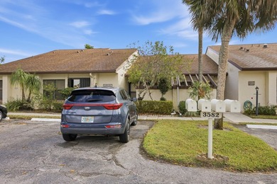 Move-in ready in a desirable 55+ community! Conveniently located on Palm Beach National Golf and Country Club in Florida - for sale on GolfHomes.com, golf home, golf lot
