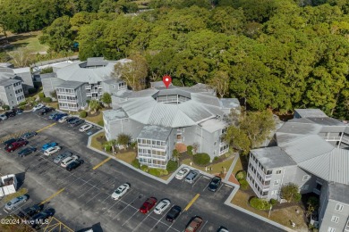 Welcome to this second-floor condominium, ideally located in the on Carolina Shores Golf Course in North Carolina - for sale on GolfHomes.com, golf home, golf lot