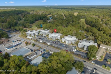 Welcome to this second-floor condominium, ideally located in the on Carolina Shores Golf Course in North Carolina - for sale on GolfHomes.com, golf home, golf lot