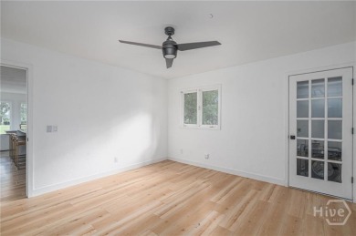 Flooded with natural light, this stunning Scandinavian-inspired on The Landings Club - Plantation in Georgia - for sale on GolfHomes.com, golf home, golf lot
