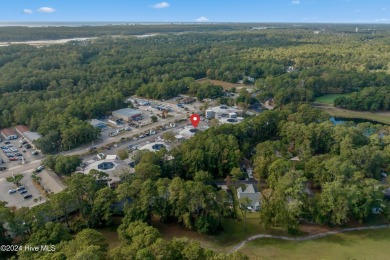 Welcome to this second-floor condominium, ideally located in the on Carolina Shores Golf Course in North Carolina - for sale on GolfHomes.com, golf home, golf lot