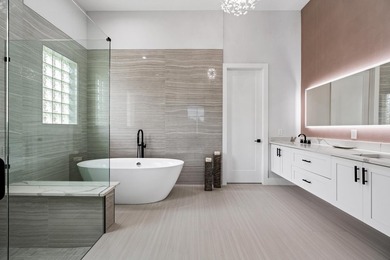 This stunning, renovated estate home is ideally situated within on  in Florida - for sale on GolfHomes.com, golf home, golf lot