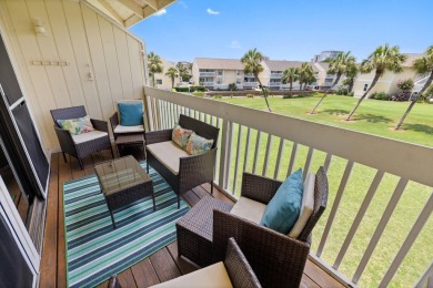Discover this elegantly appointed second-floor, 2-bedroom on Sandpiper Cove Golf Course in Florida - for sale on GolfHomes.com, golf home, golf lot