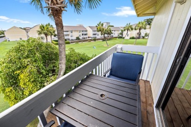 Discover this elegantly appointed second-floor, 2-bedroom on Sandpiper Cove Golf Course in Florida - for sale on GolfHomes.com, golf home, golf lot