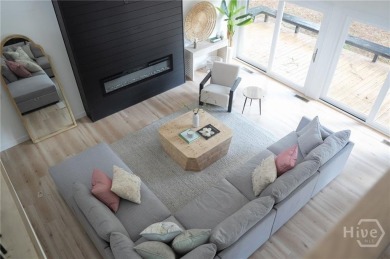 Flooded with natural light, this stunning Scandinavian-inspired on The Landings Club - Plantation in Georgia - for sale on GolfHomes.com, golf home, golf lot