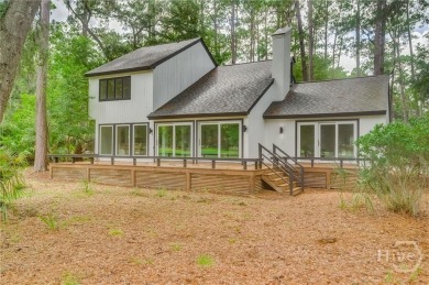 Flooded with natural light, this stunning Scandinavian-inspired on The Landings Club - Plantation in Georgia - for sale on GolfHomes.com, golf home, golf lot