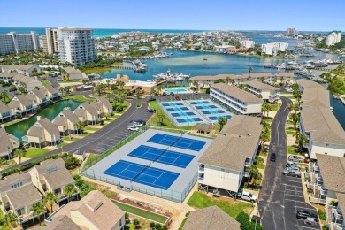 Discover this elegantly appointed second-floor, 2-bedroom on Sandpiper Cove Golf Course in Florida - for sale on GolfHomes.com, golf home, golf lot