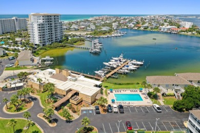 Discover this elegantly appointed second-floor, 2-bedroom on Sandpiper Cove Golf Course in Florida - for sale on GolfHomes.com, golf home, golf lot