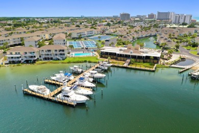 Discover this elegantly appointed second-floor, 2-bedroom on Sandpiper Cove Golf Course in Florida - for sale on GolfHomes.com, golf home, golf lot