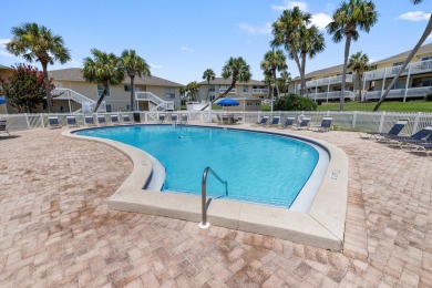 Discover this elegantly appointed second-floor, 2-bedroom on Sandpiper Cove Golf Course in Florida - for sale on GolfHomes.com, golf home, golf lot