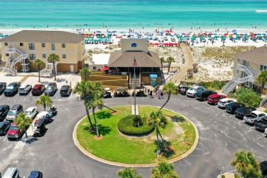 Discover this elegantly appointed second-floor, 2-bedroom on Sandpiper Cove Golf Course in Florida - for sale on GolfHomes.com, golf home, golf lot