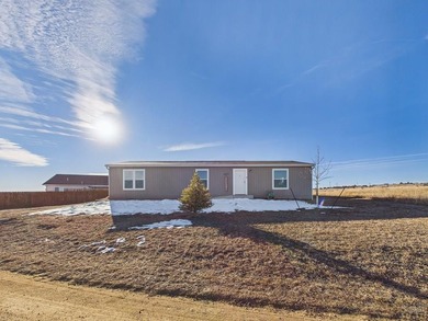 This well-maintained 3-bedroom, 2-bathroom manufactured home on Hollydot Golf Course in Colorado - for sale on GolfHomes.com, golf home, golf lot