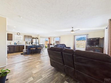 This well-maintained 3-bedroom, 2-bathroom manufactured home on Hollydot Golf Course in Colorado - for sale on GolfHomes.com, golf home, golf lot