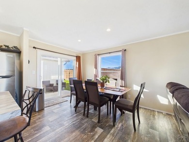 This well-maintained 3-bedroom, 2-bathroom manufactured home on Hollydot Golf Course in Colorado - for sale on GolfHomes.com, golf home, golf lot