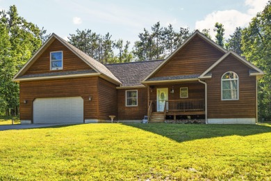 This beautifully designed home offers the perfect blend of on Michaywe Pines Course in Michigan - for sale on GolfHomes.com, golf home, golf lot
