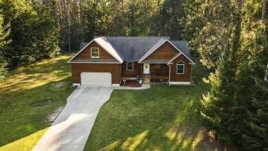 This beautifully designed home offers the perfect blend of on Michaywe Pines Course in Michigan - for sale on GolfHomes.com, golf home, golf lot