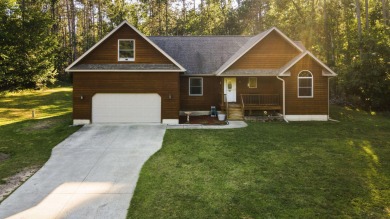 This beautifully designed home offers the perfect blend of on Michaywe Pines Course in Michigan - for sale on GolfHomes.com, golf home, golf lot