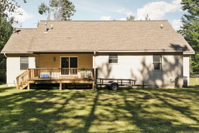 This beautifully designed home offers the perfect blend of on Michaywe Pines Course in Michigan - for sale on GolfHomes.com, golf home, golf lot