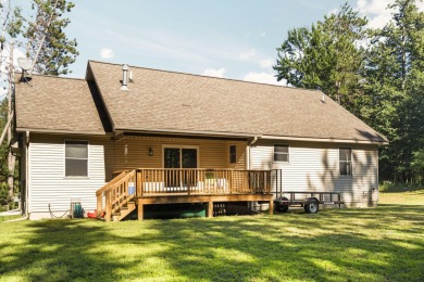This beautifully designed home offers the perfect blend of on Michaywe Pines Course in Michigan - for sale on GolfHomes.com, golf home, golf lot