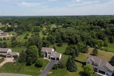 Experience refined living in this stunning 5-bed, 4-bath home on on Vintage Golf Course in Minnesota - for sale on GolfHomes.com, golf home, golf lot